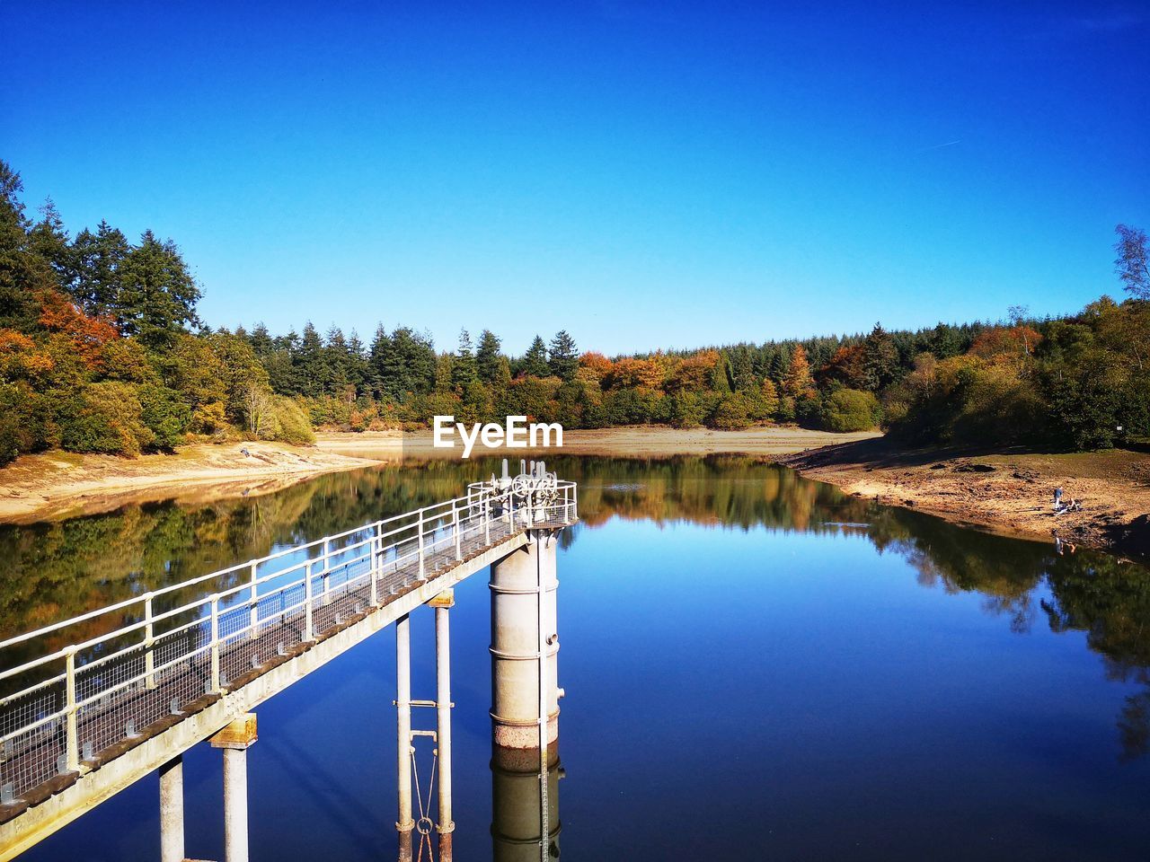 SCENIC VIEW OF BRIDGE AGAINST BLUE SKY