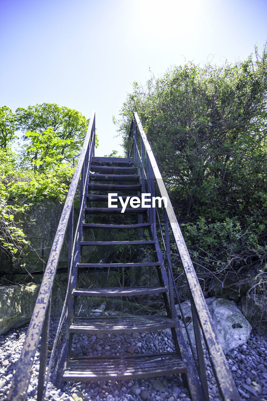 Low angle view of stairs against clear sky