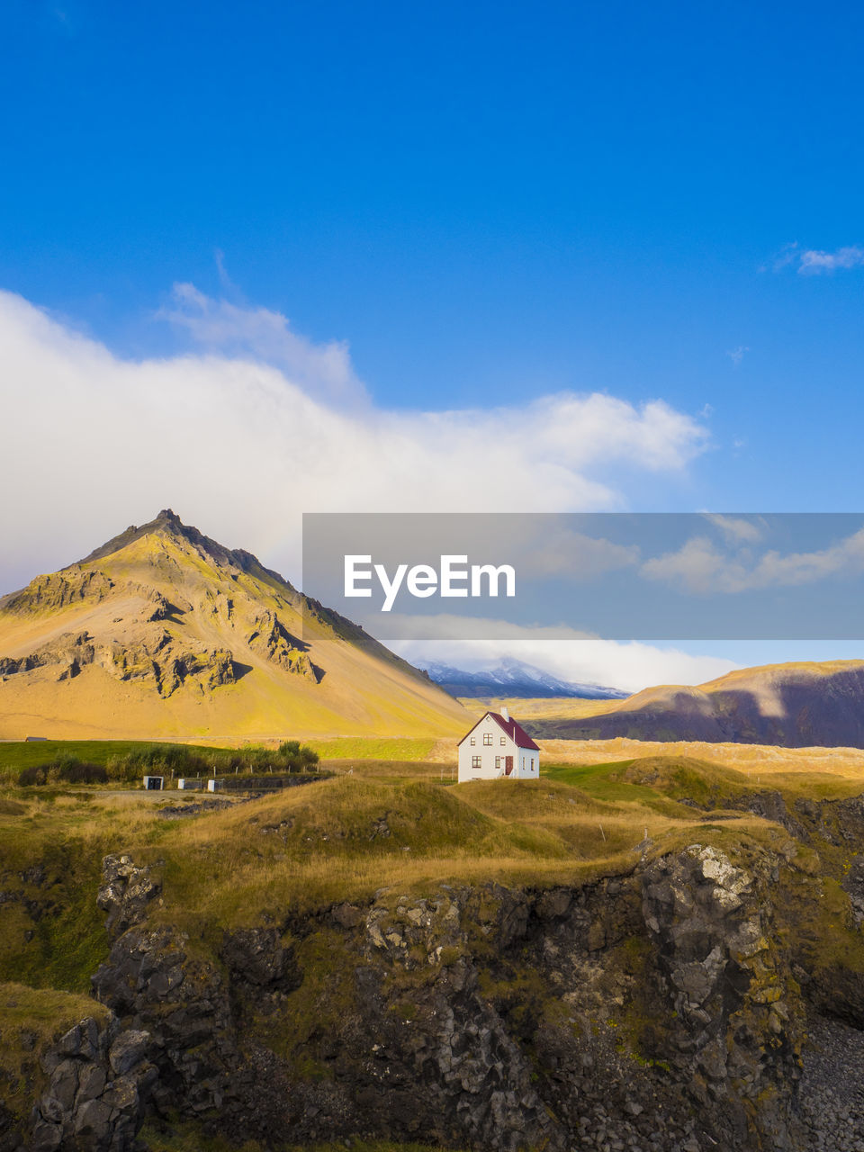 Scenic view of landscape and mountains against sky