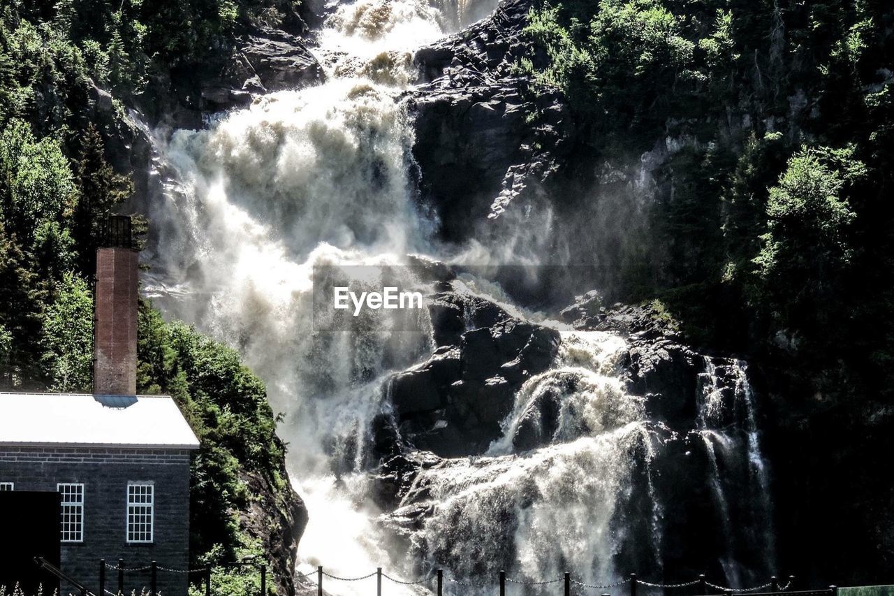 SCENIC VIEW OF WATERFALL