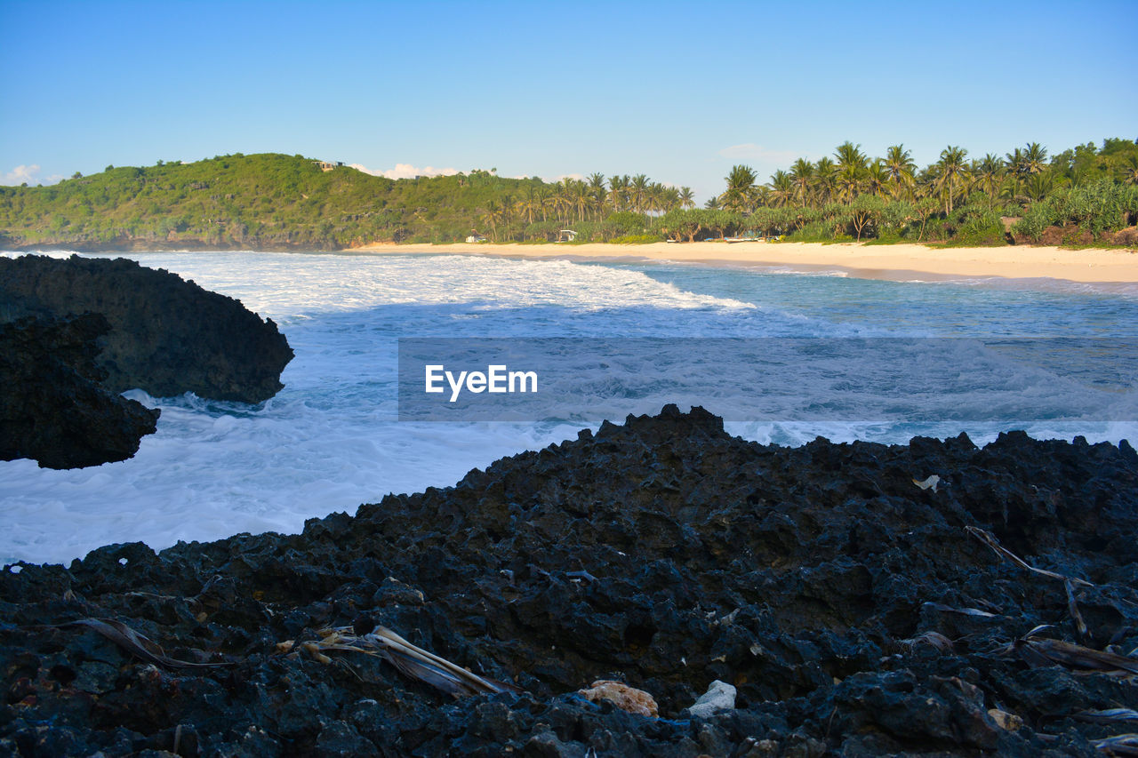 Scenic view of sea against clear sky