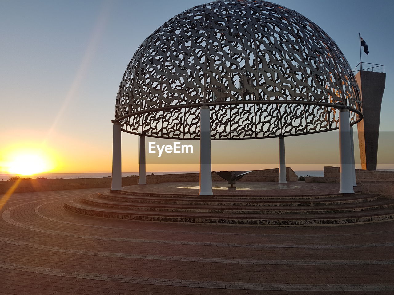 METALLIC STRUCTURE AGAINST SKY DURING SUNSET