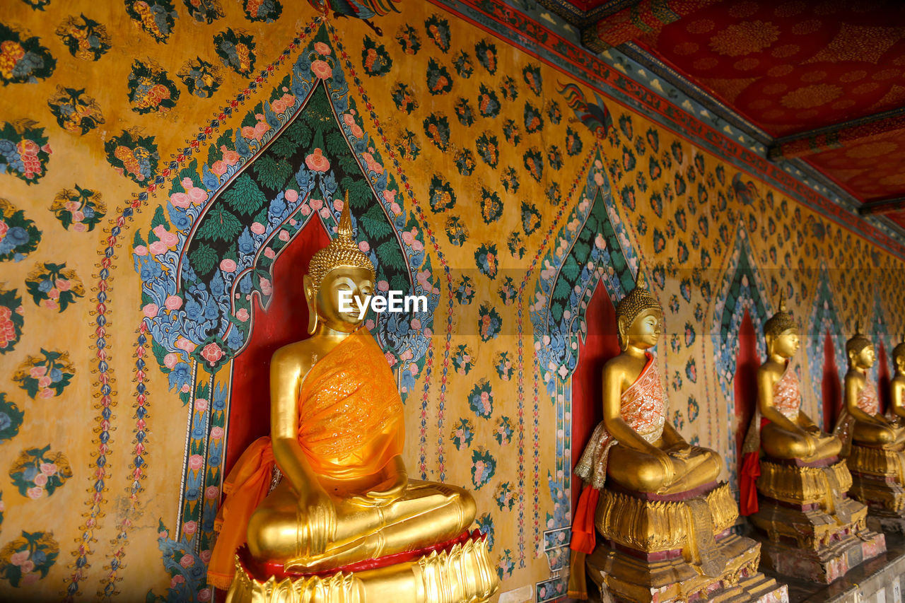 SCULPTURE OF BUDDHA STATUE IN TEMPLE