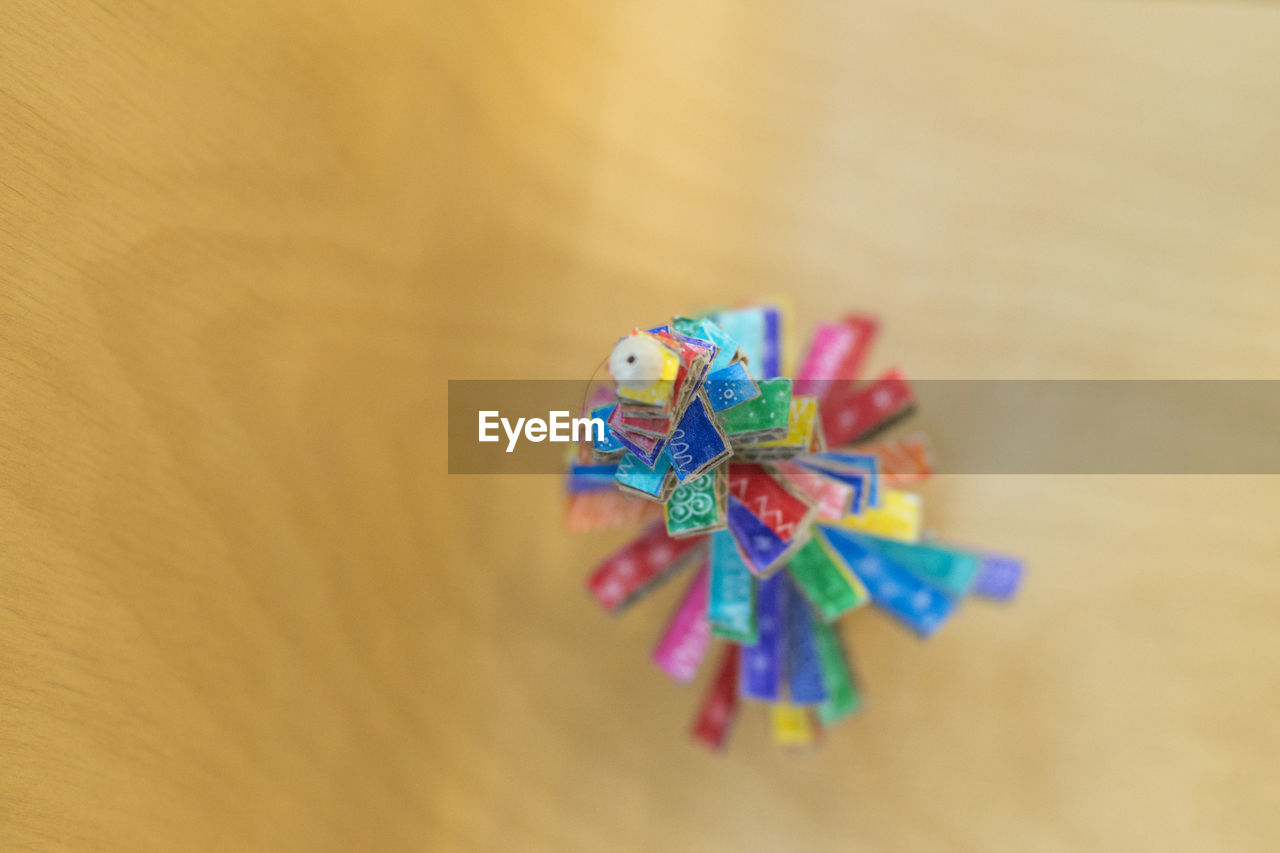 High angle view of colorful artwork on table