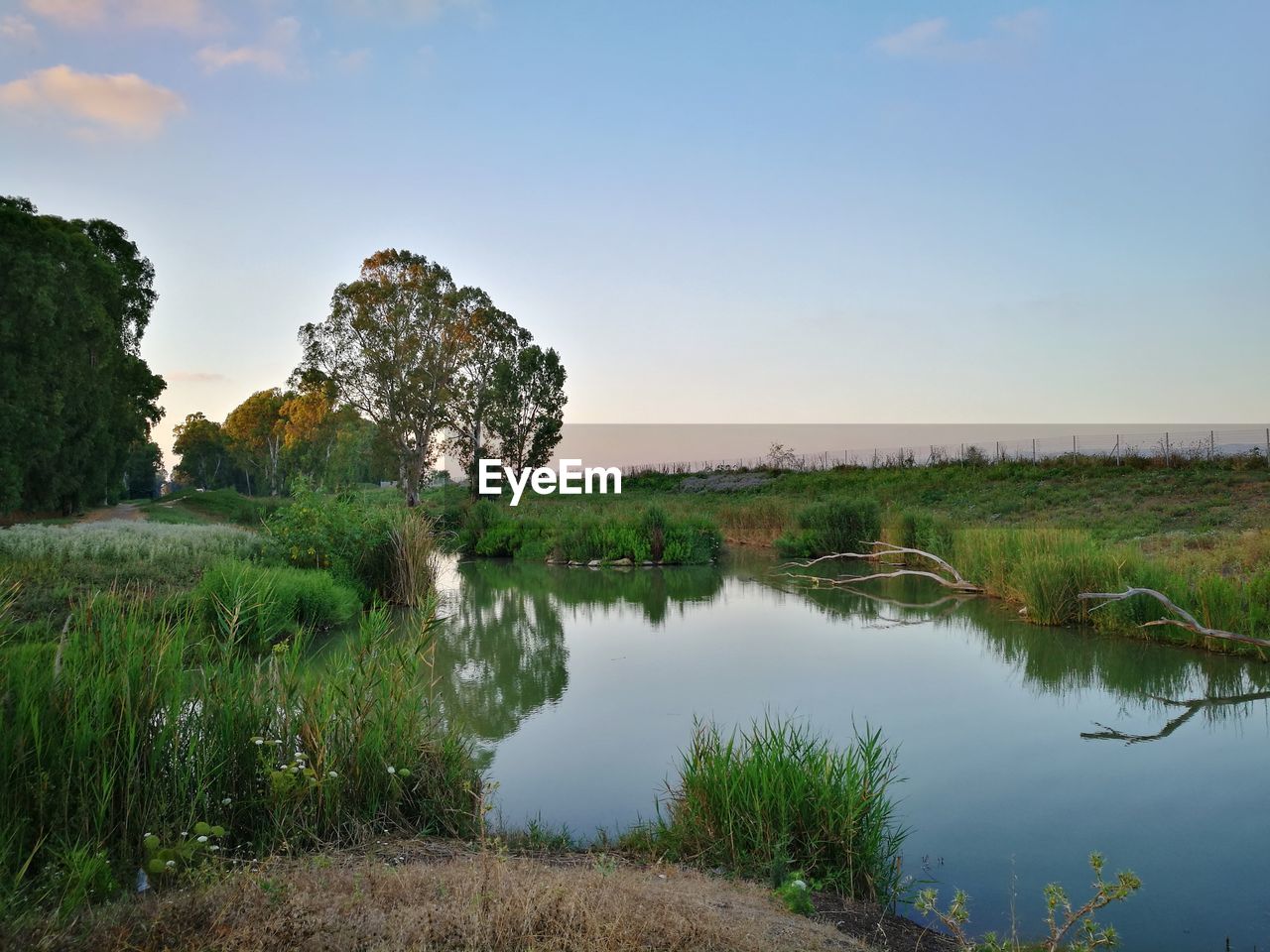 Scenic view of lake against sky