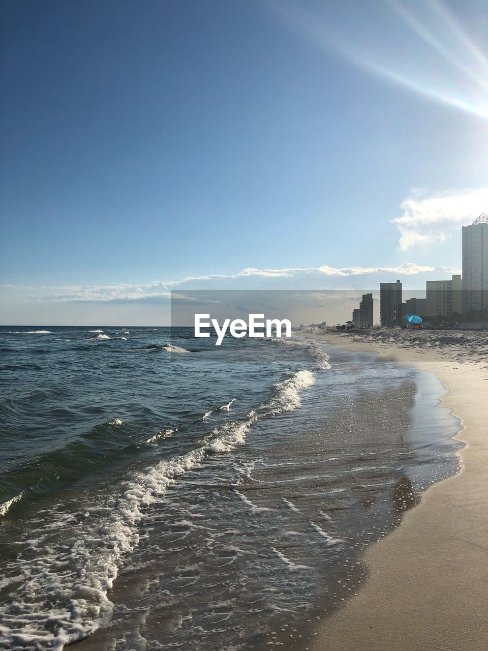 PANORAMIC VIEW OF BEACH AGAINST SKY