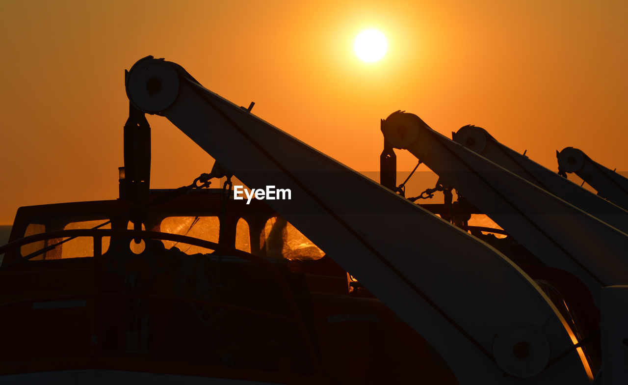 Low angle view of silhouette  against sky during sunset