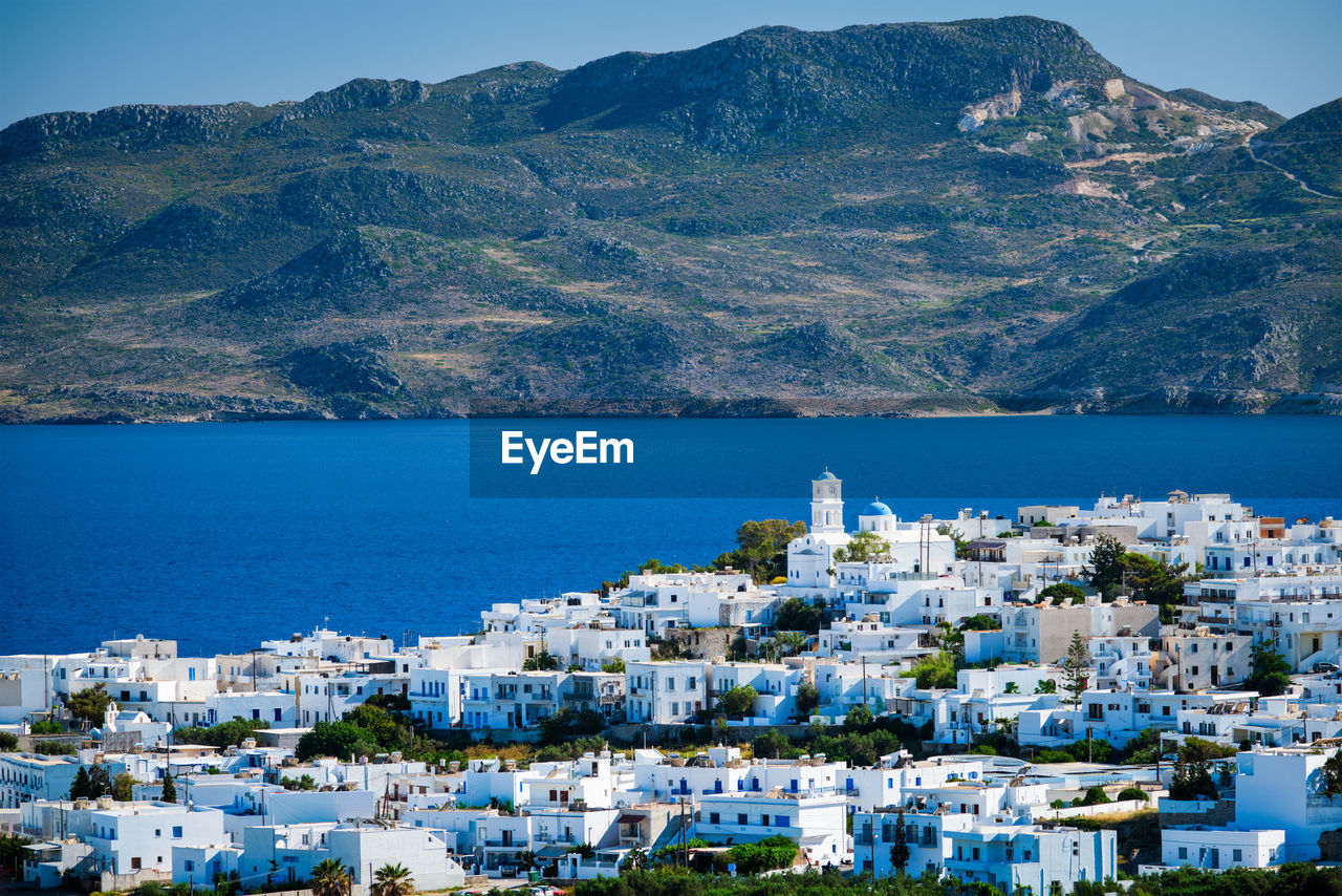 View of plaka village with traditional greek church. milos island, greece