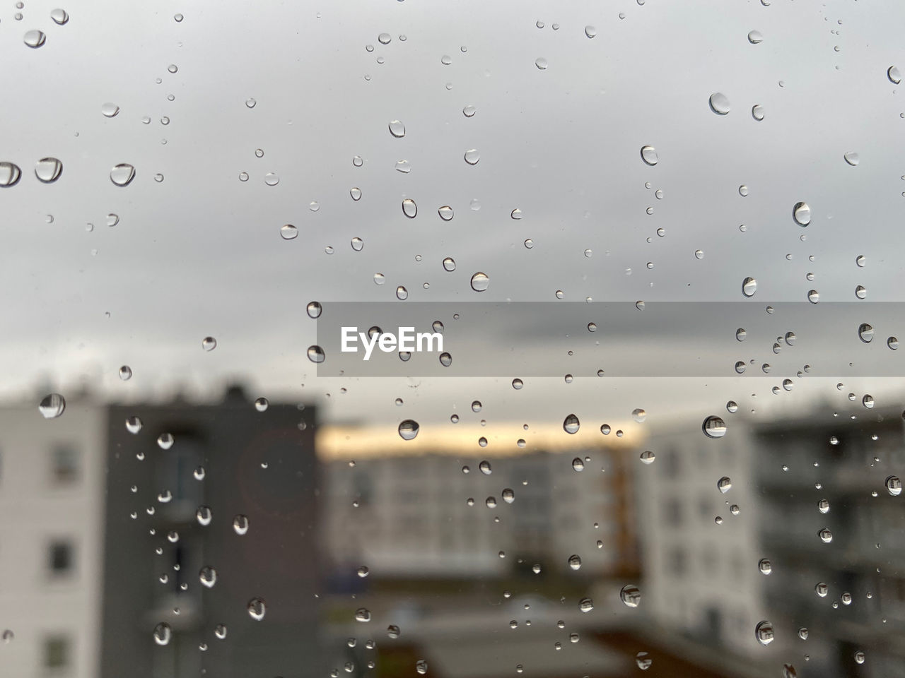 RAINDROPS ON GLASS WINDOW