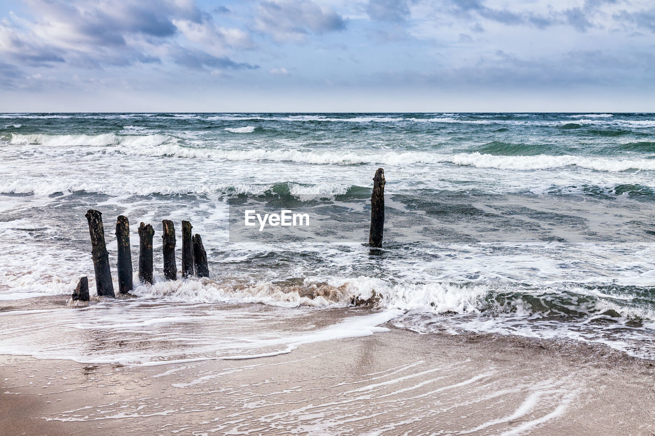 Scenic view of beach against sky