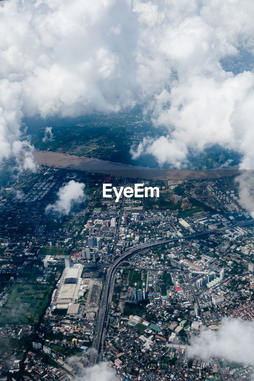 AERIAL VIEW OF CITY AGAINST SKY