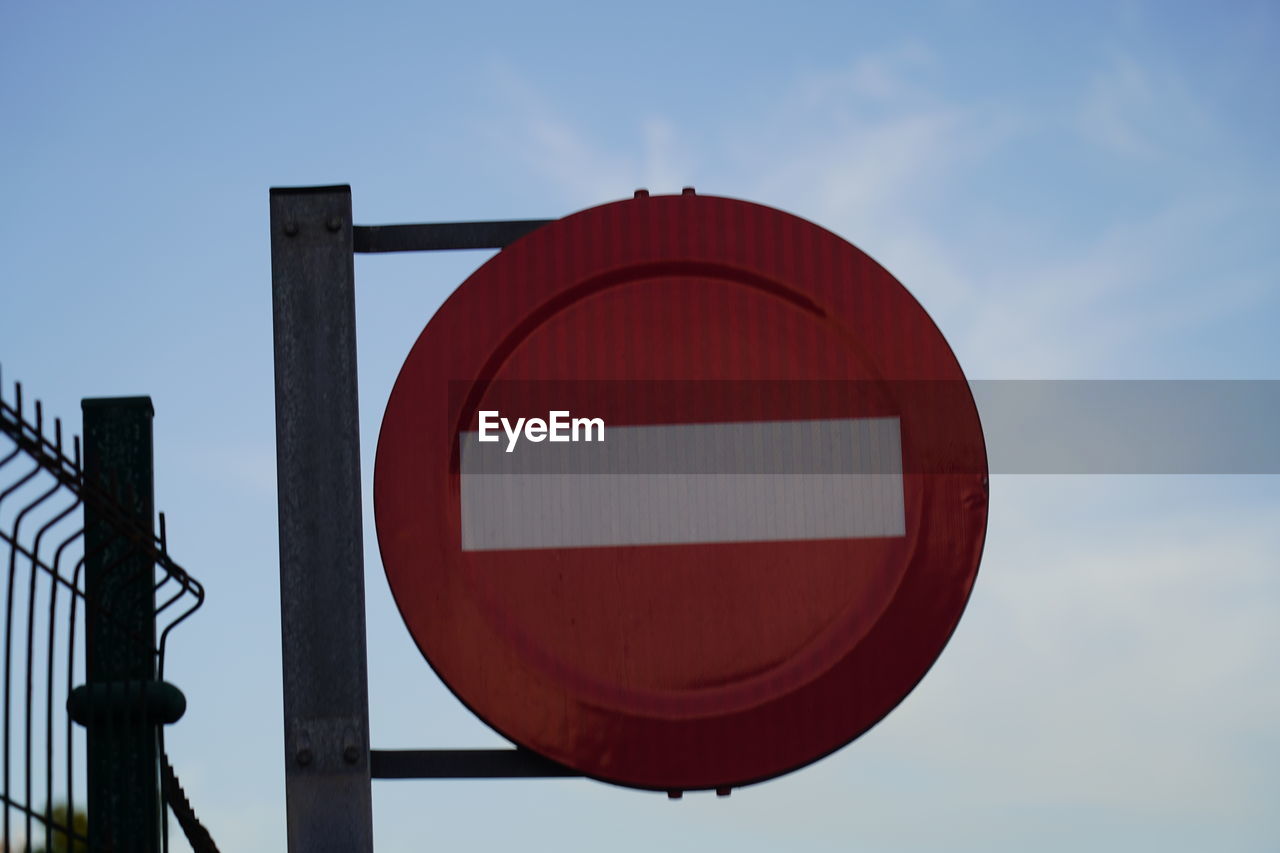 LOW ANGLE VIEW OF ROAD SIGN