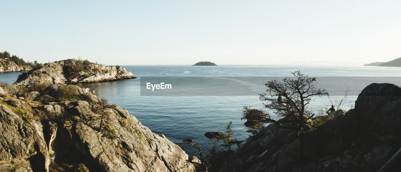 Scenic view of sea against clear sky