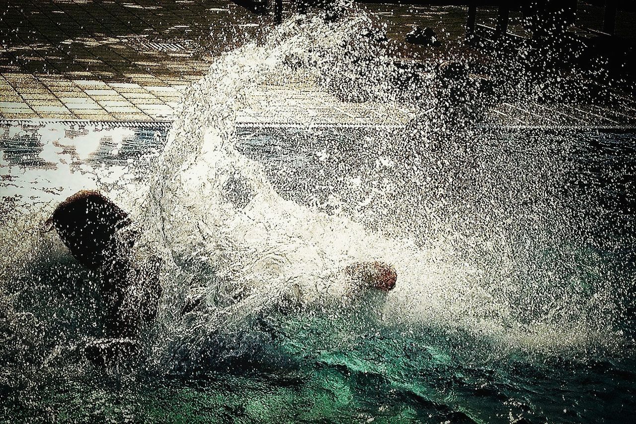 Person swimming in pool