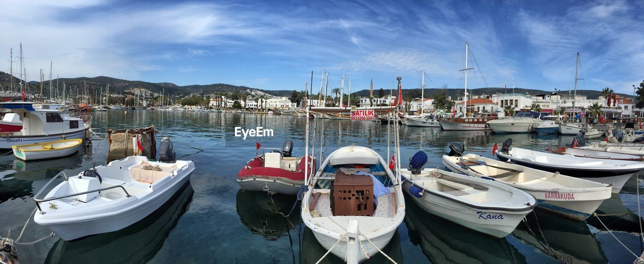 Boats moored at marina