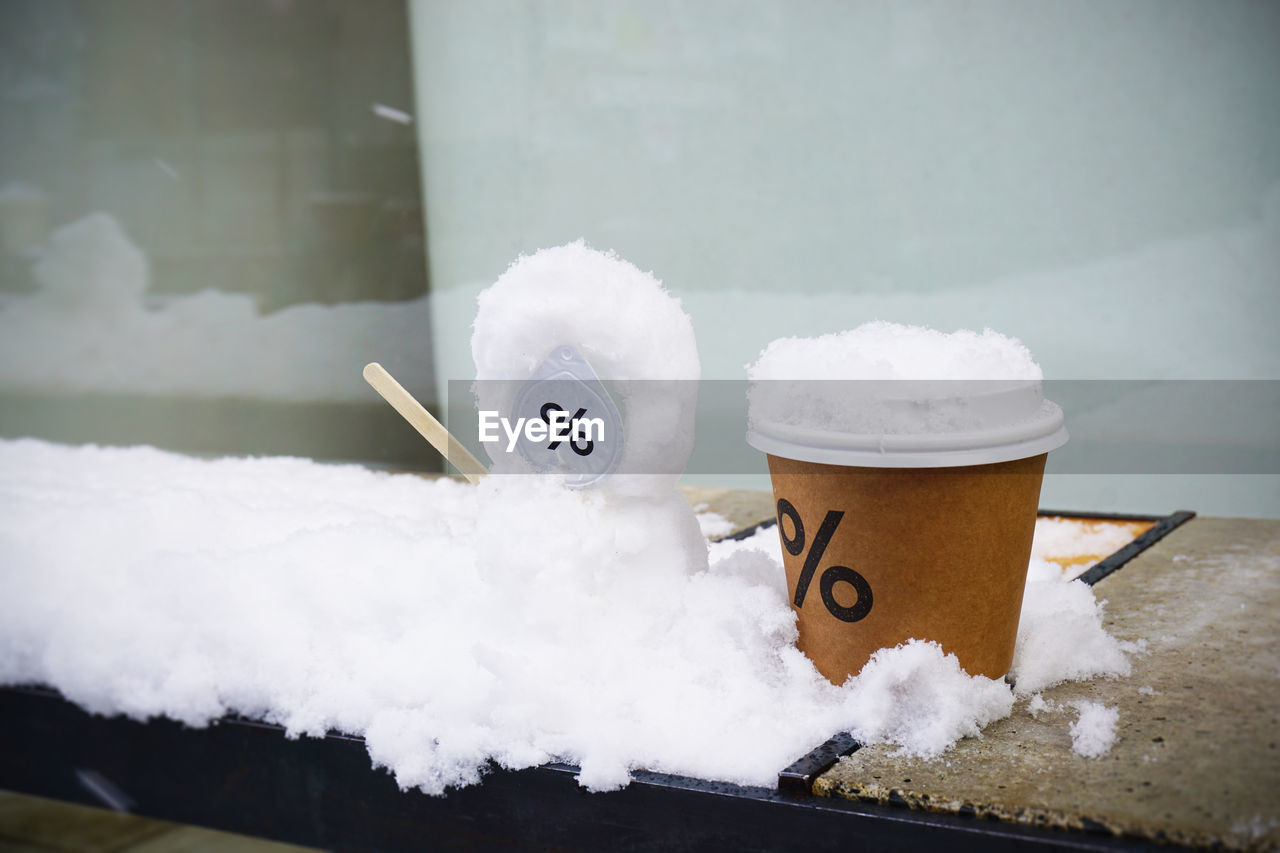 CLOSE-UP OF SNOW COVERED WITH ICE