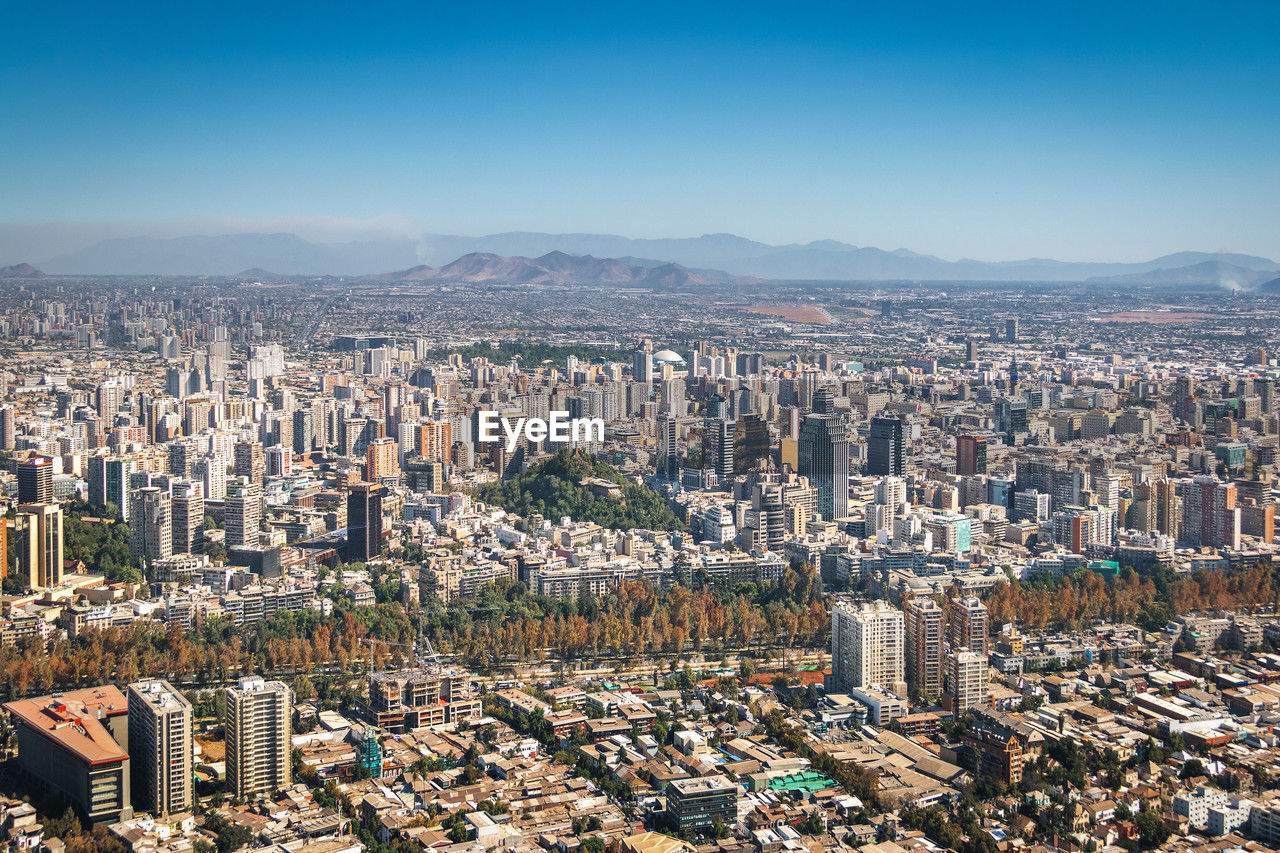 aerial view of city buildings against sky