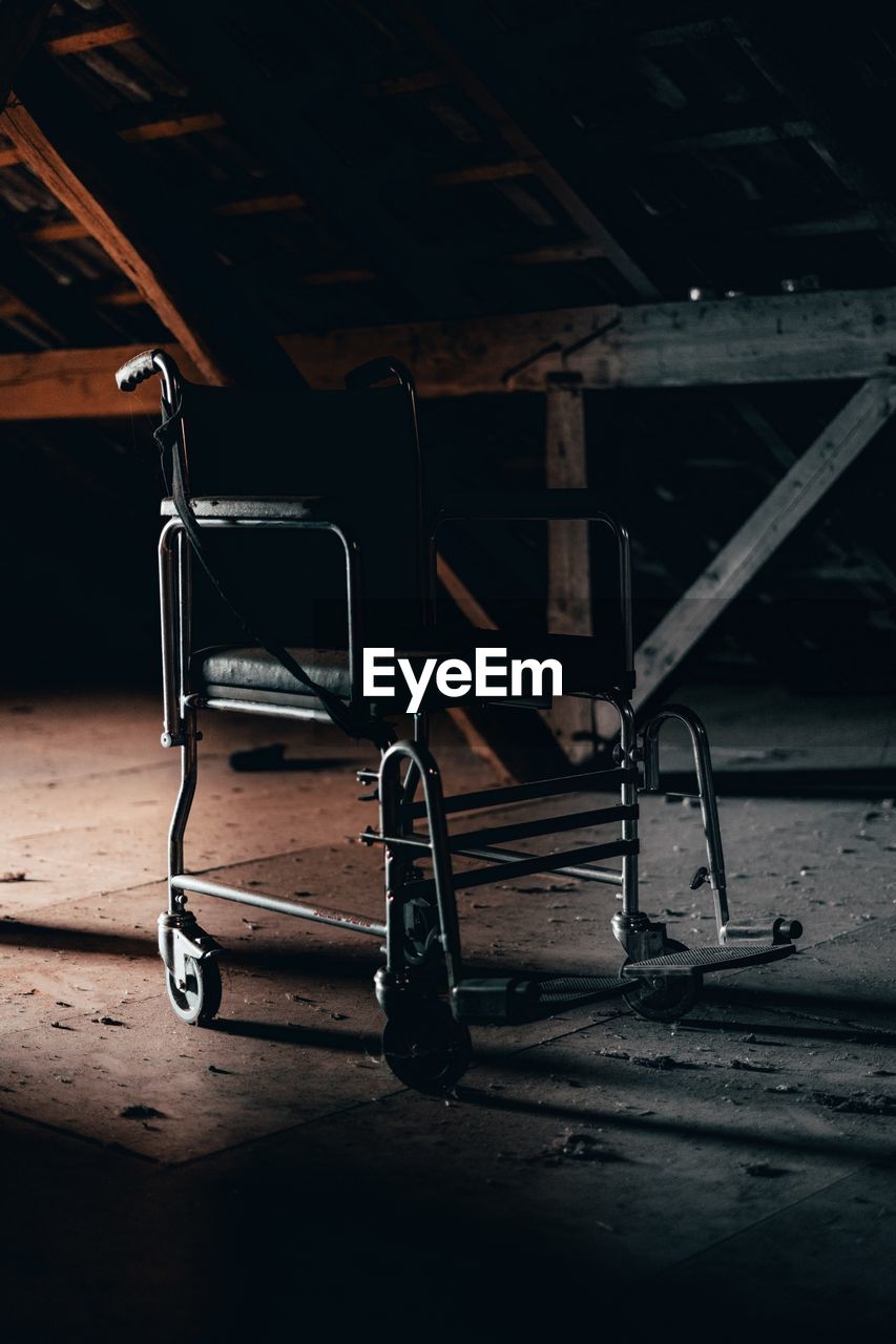 Close-up of abandoned shopping cart on floor