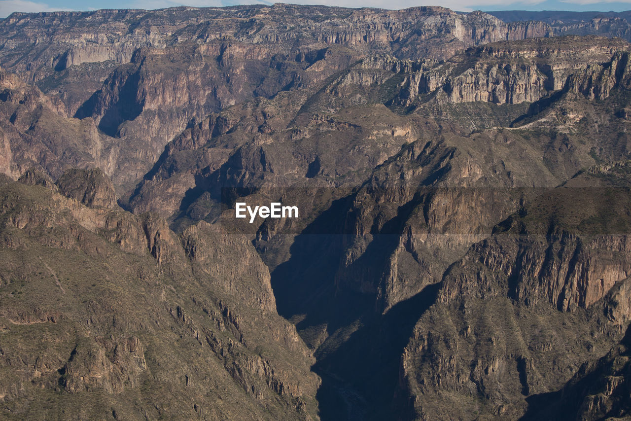 Scenic view of rocky mountains against sky on copper canyon / barrancas del cobre