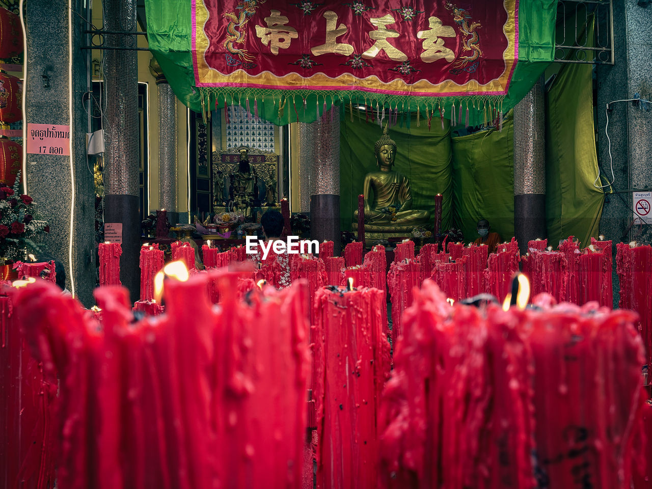 Panoramic view of red bell hanging in market