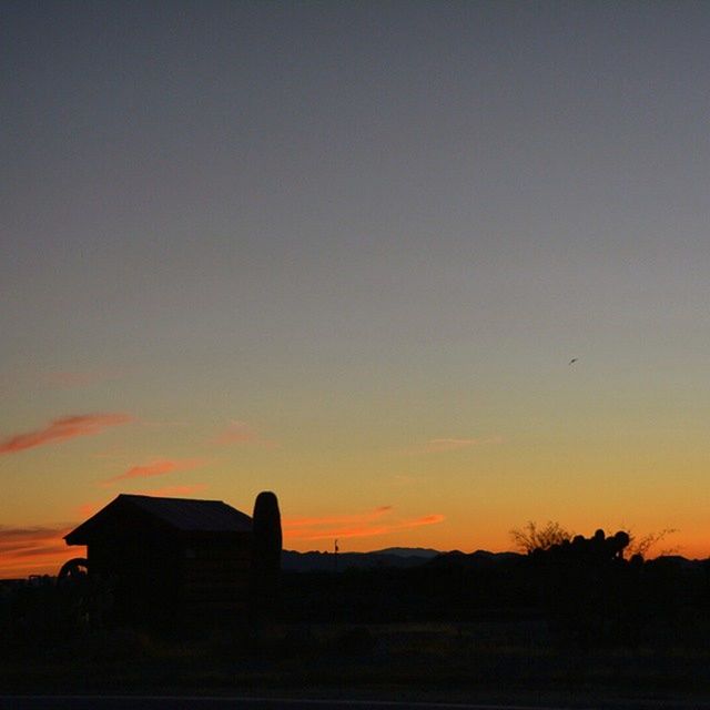 SILHOUETTE OF LANDSCAPE AT SUNSET