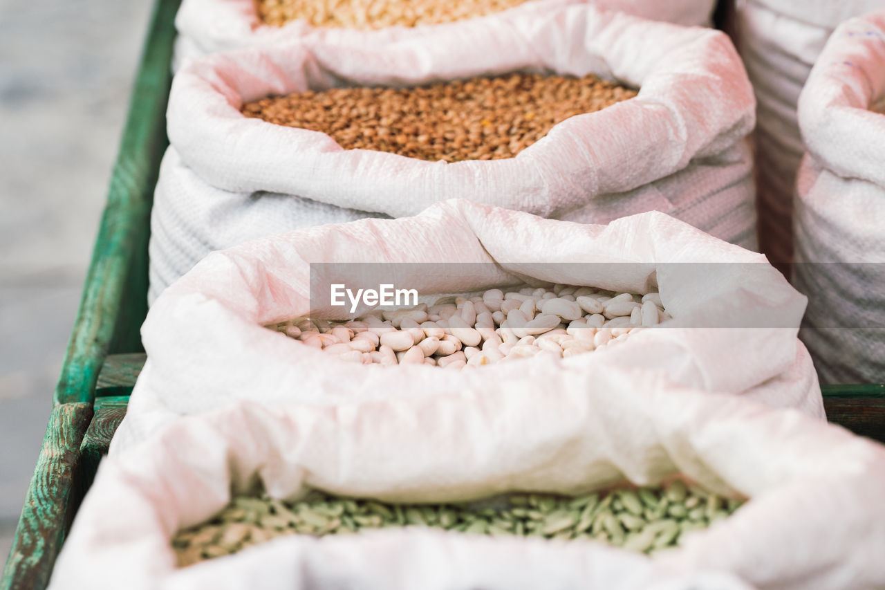 Sacks of legumes in a market stall