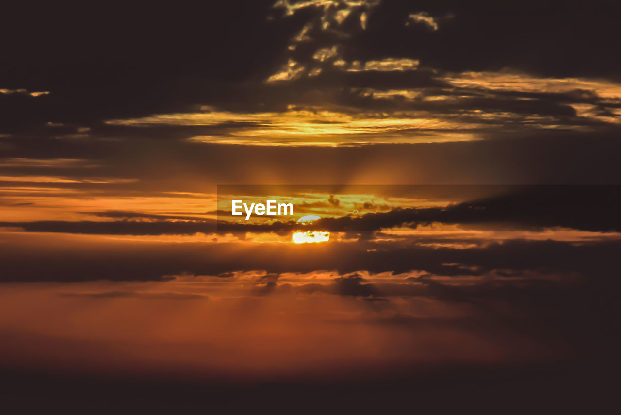 LOW ANGLE VIEW OF CLOUDSCAPE DURING SUNSET