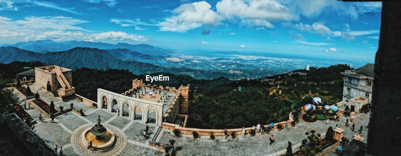 HIGH ANGLE VIEW OF TOURISTS IN TOWN