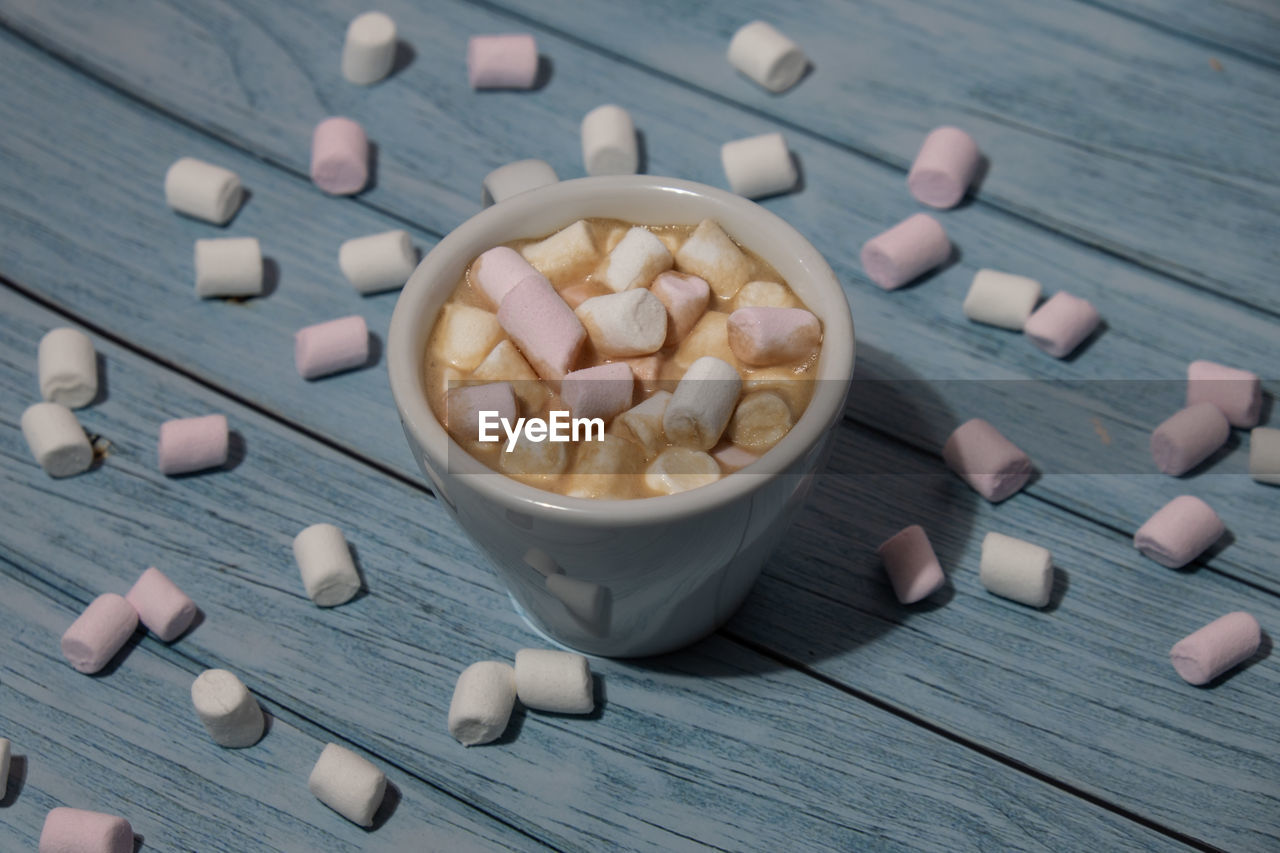 directly above shot of pills in bowl on table