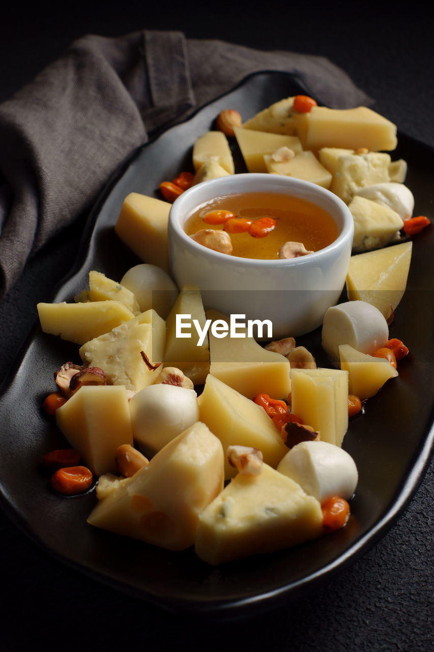 CLOSE-UP OF SERVED FOOD IN BOWL