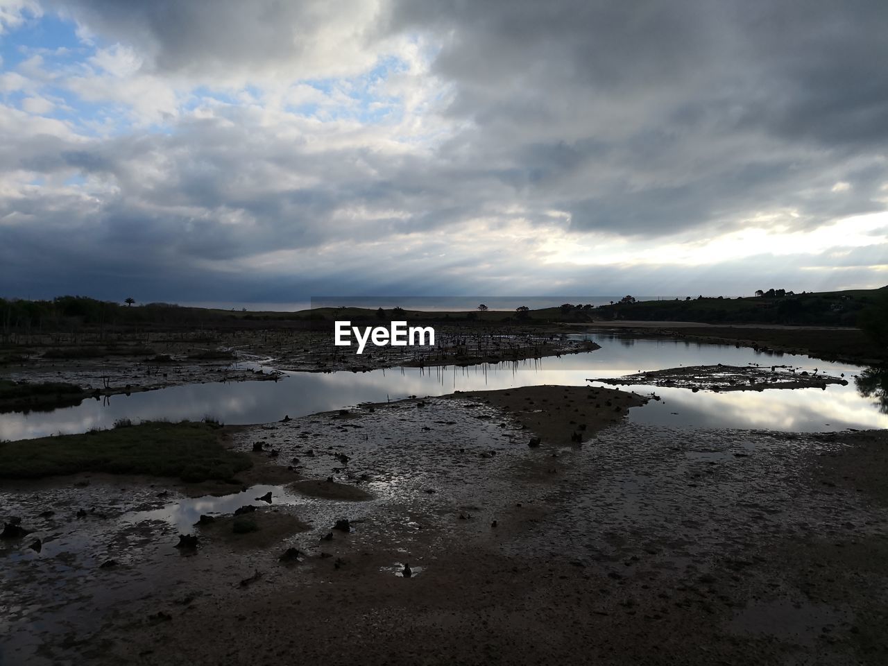 PANORAMIC VIEW OF BEACH AGAINST SKY