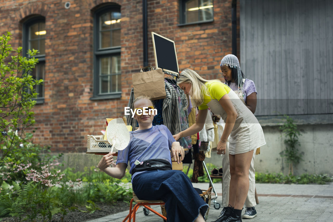 Young people at yard sale