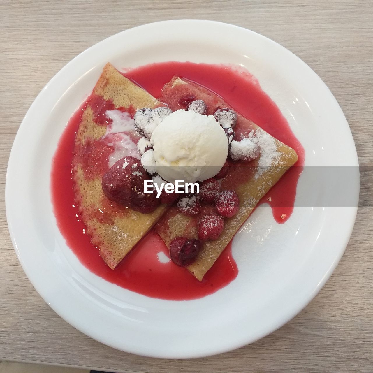 HIGH ANGLE VIEW OF ICE CREAM ON TABLE