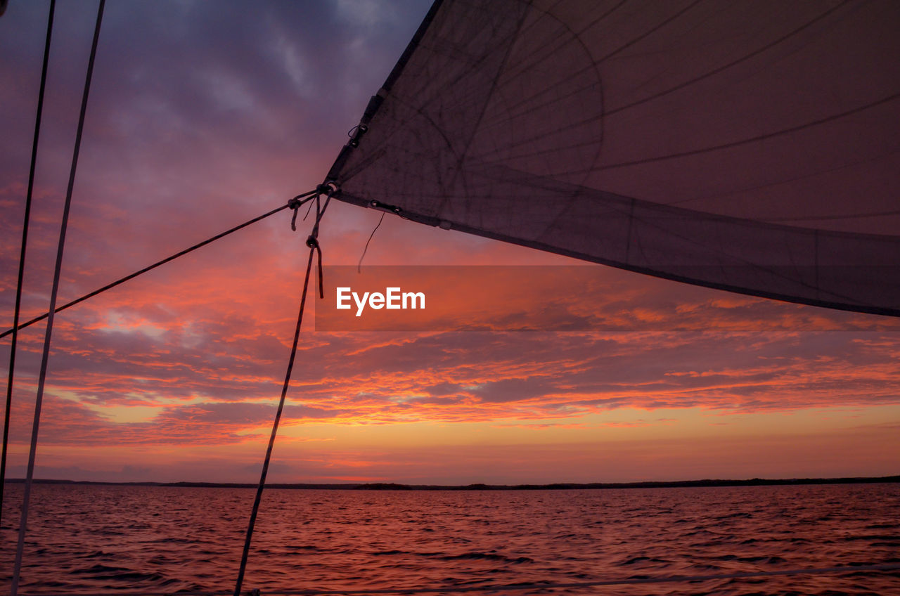 View of sail against sunset