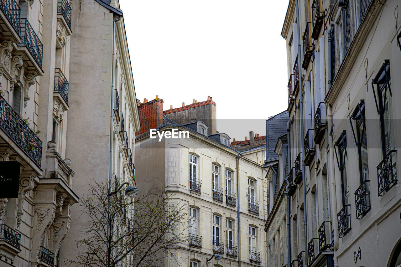 Low angle view of residential buildings against sky