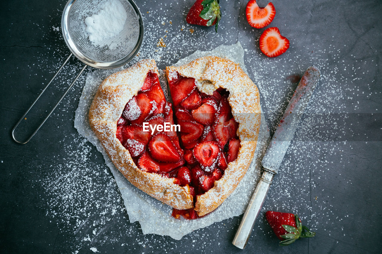 Directly above shot of strawberry tart on table