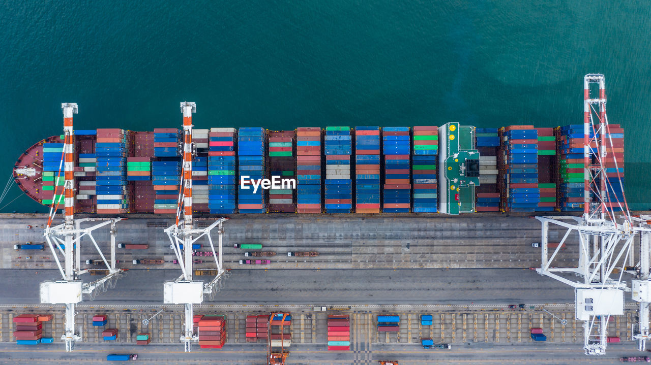 Aerial view container ship working at seaport, global business company import export logistic