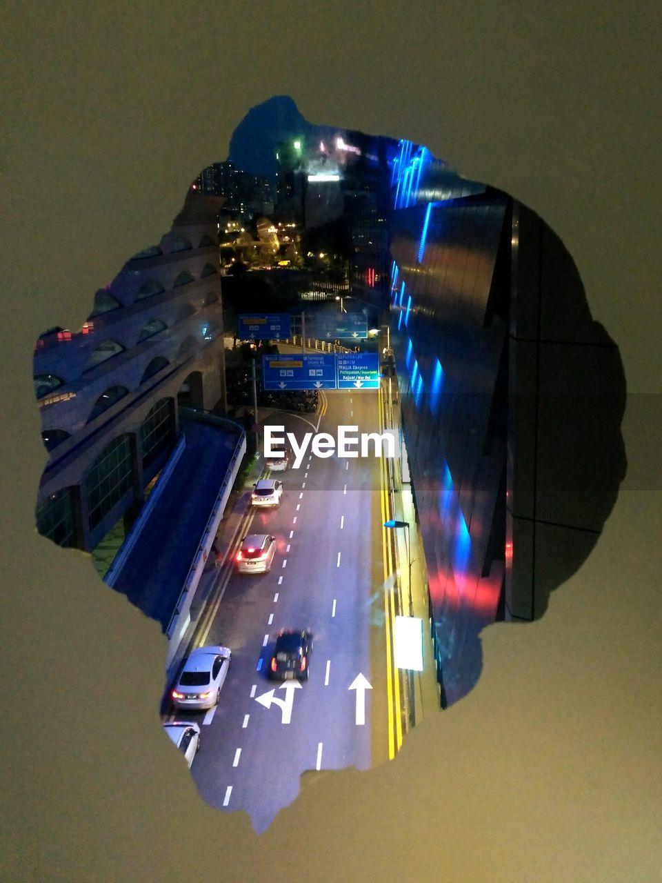 HIGH ANGLE VIEW OF CARS ON ROAD AT NIGHT