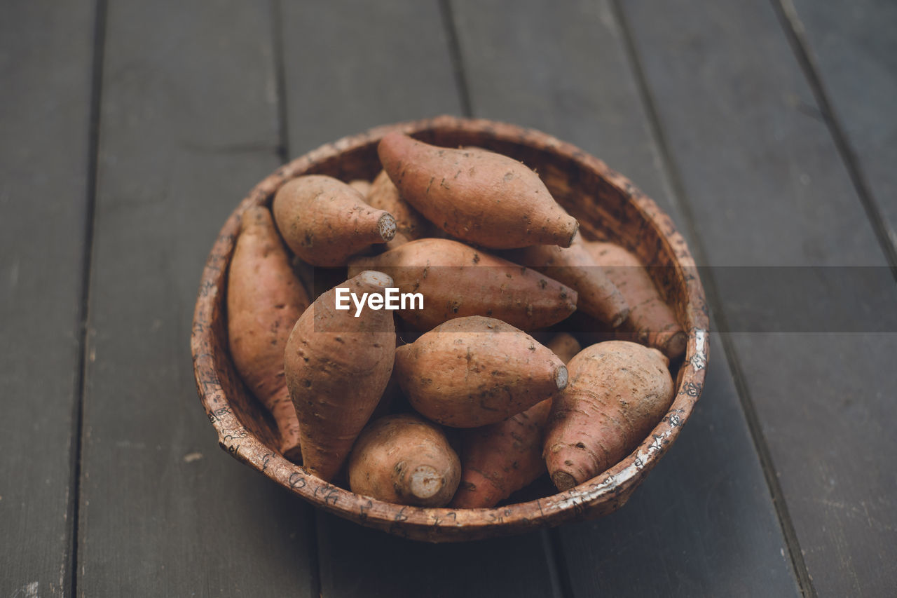 Close-up view of a pile of kagoshima's famous sweet potatoes
