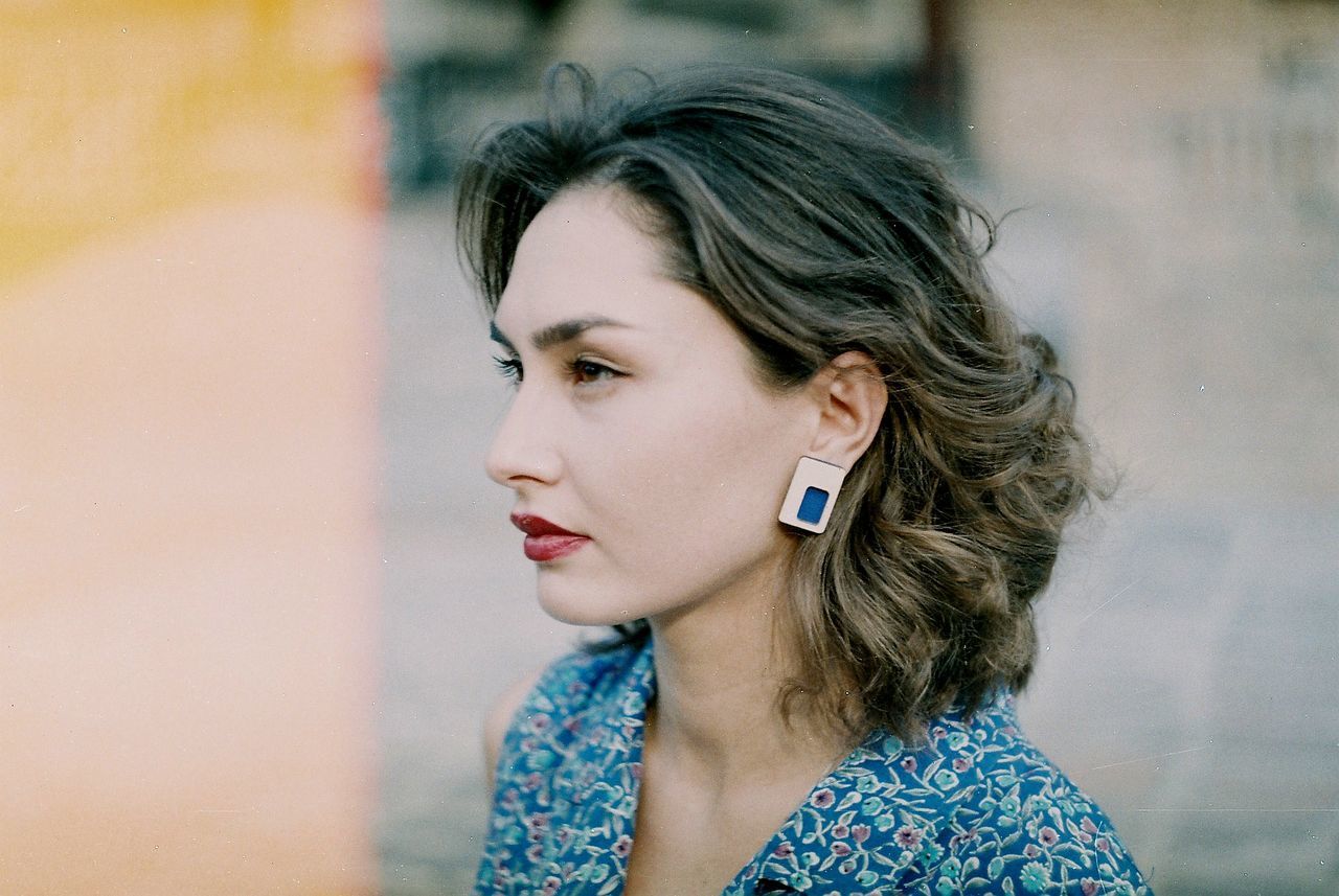 Thoughtful young woman looking away