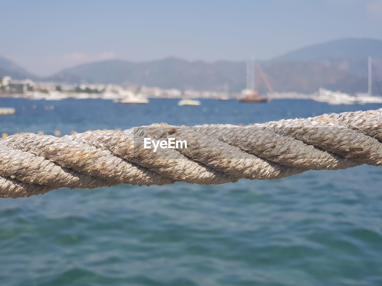 CLOSE-UP OF ROPE AGAINST SKY