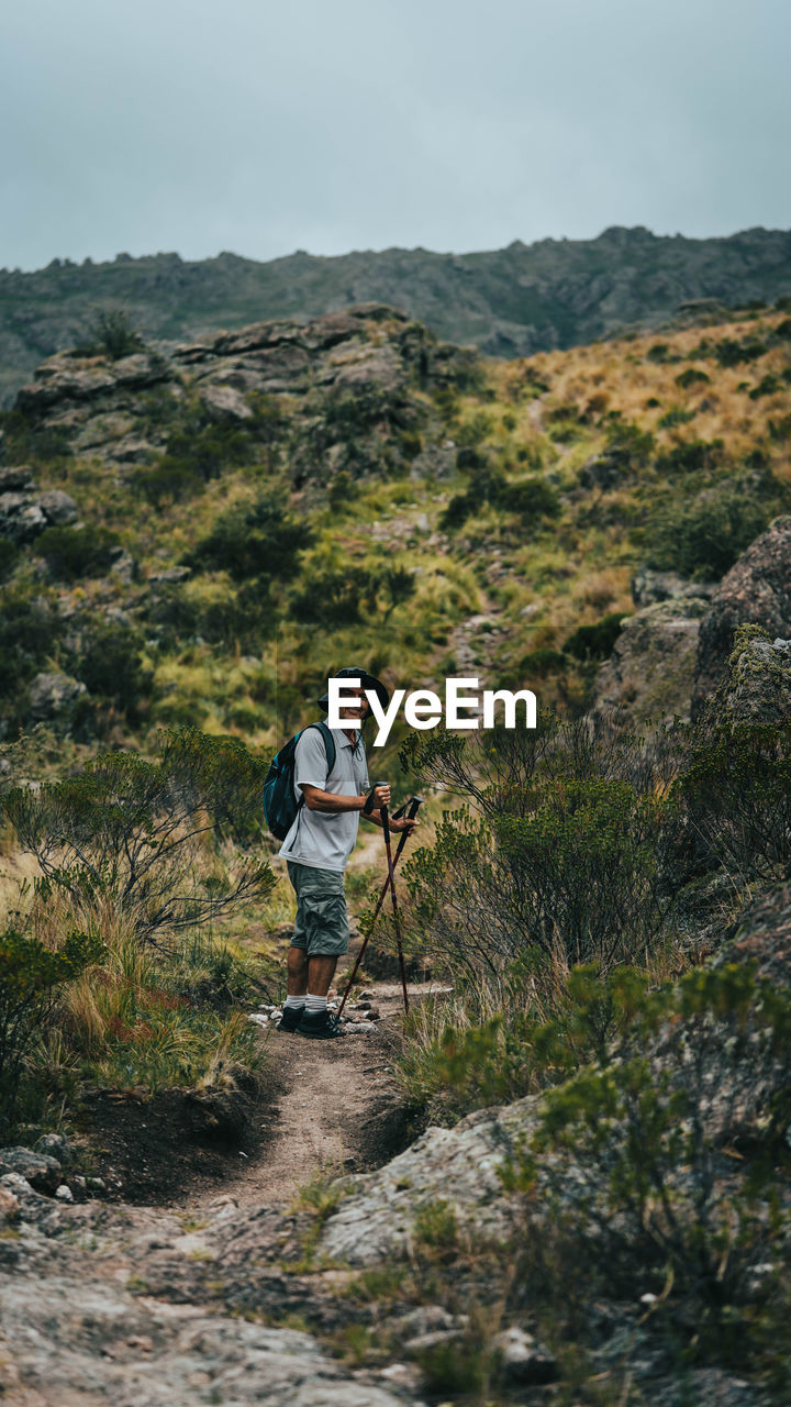 Man doing hike in an arid landscape