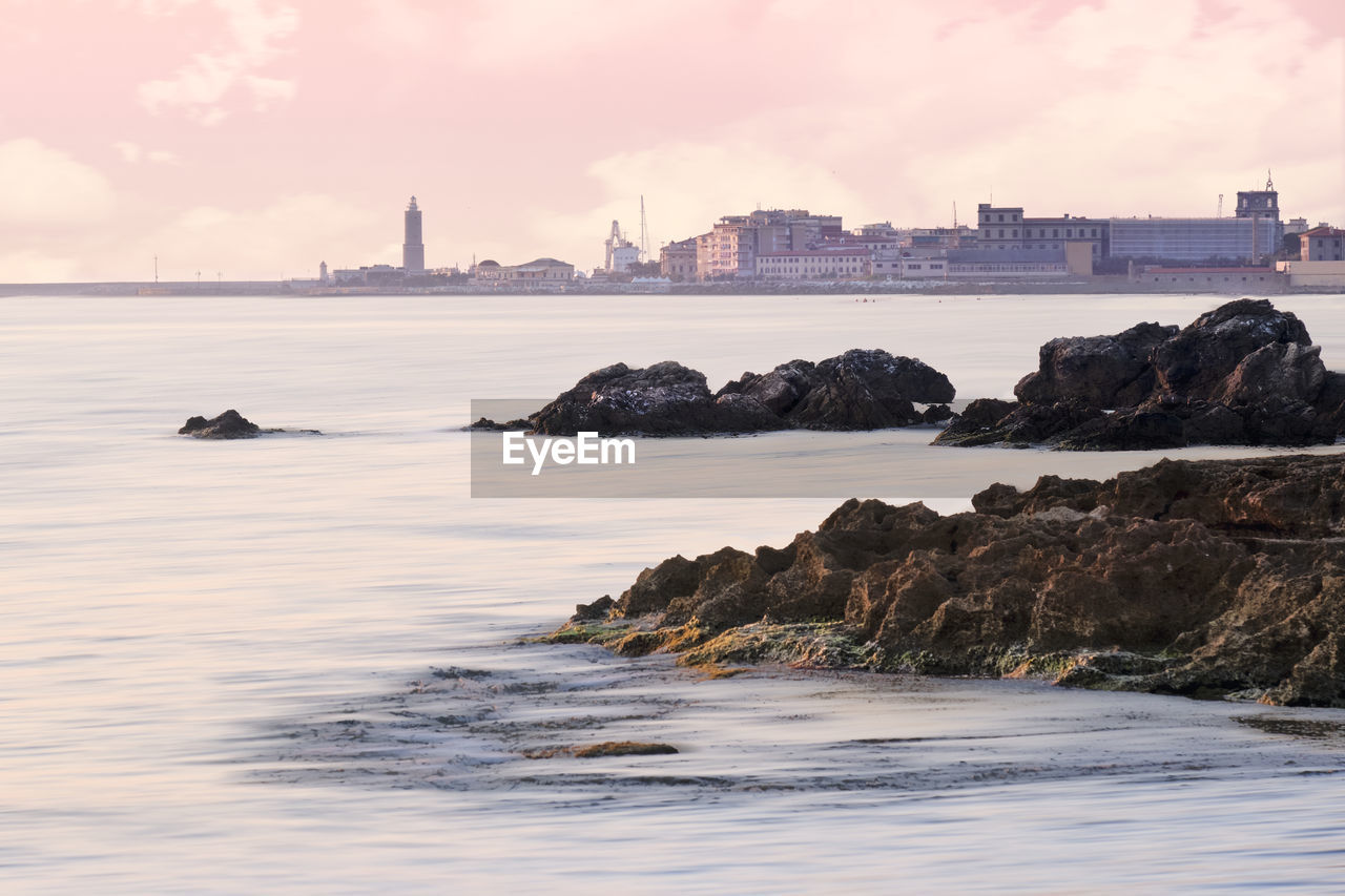 Scenic view of sea against cloudy sky at sunset in livorno, tuscany, italy, summer 2022