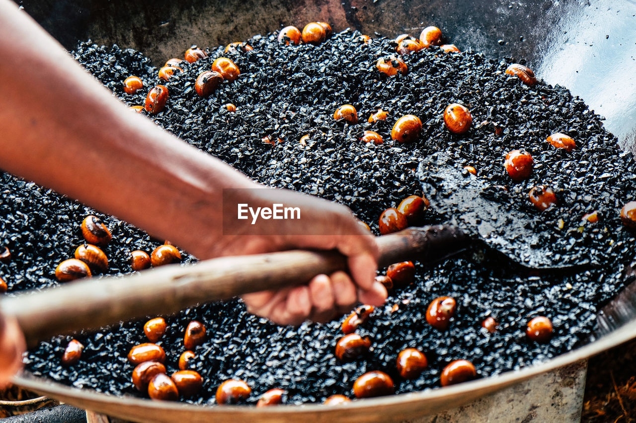 Close-up of person preparing food