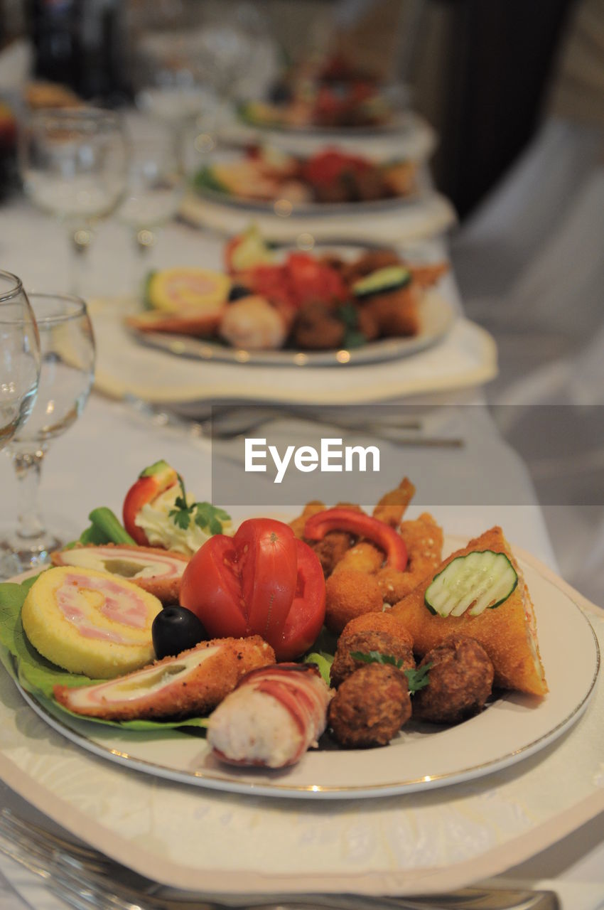 Food served in plate on table at restaurant