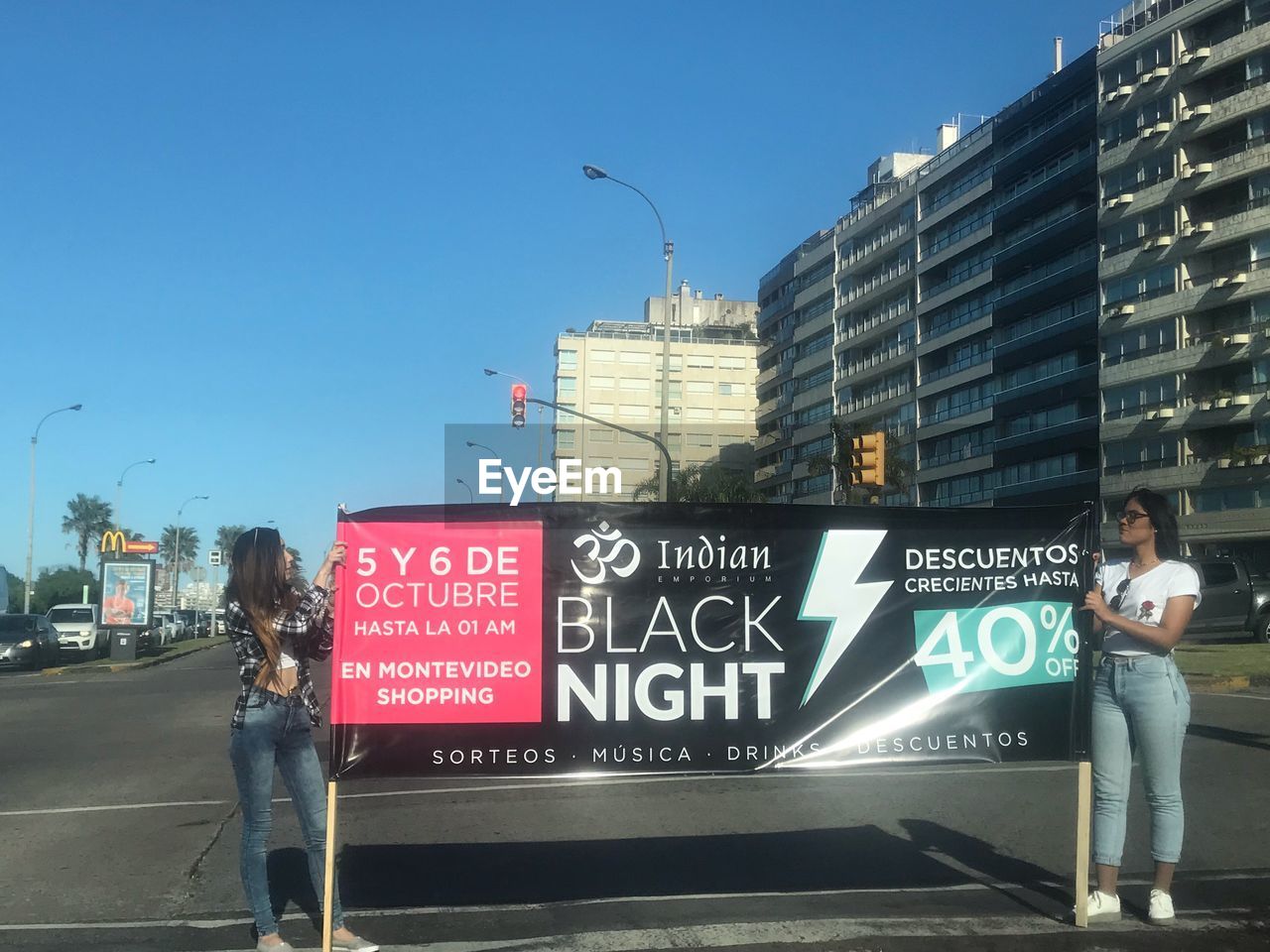 INFORMATION SIGN ON ROAD AGAINST CLEAR SKY