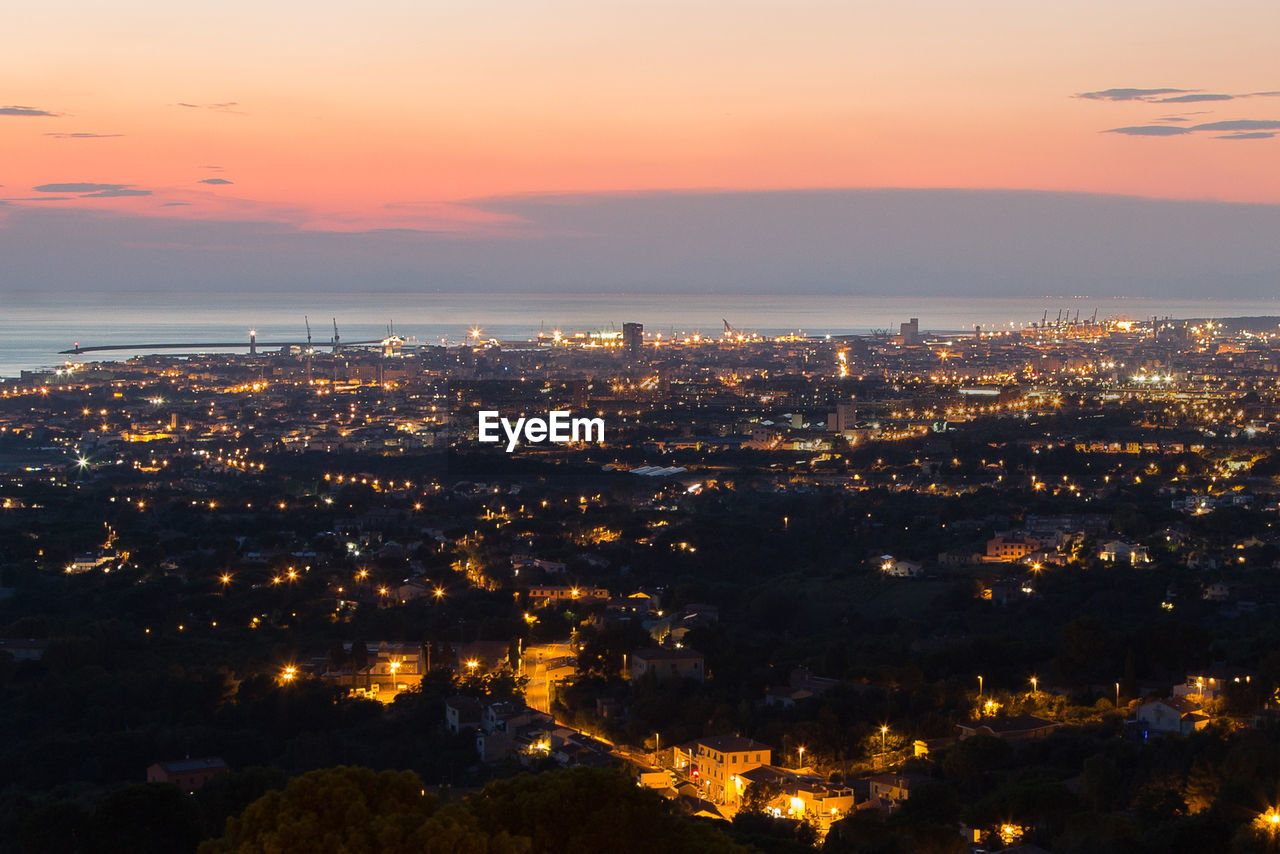 Aerial view of the city of livorno in tuscany at dusk.