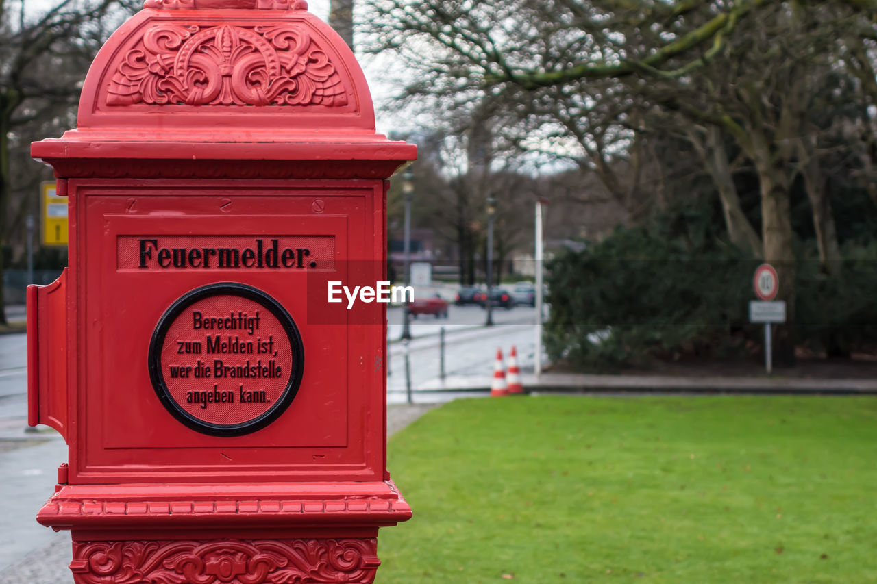 Close-up of red mailbox outdoors