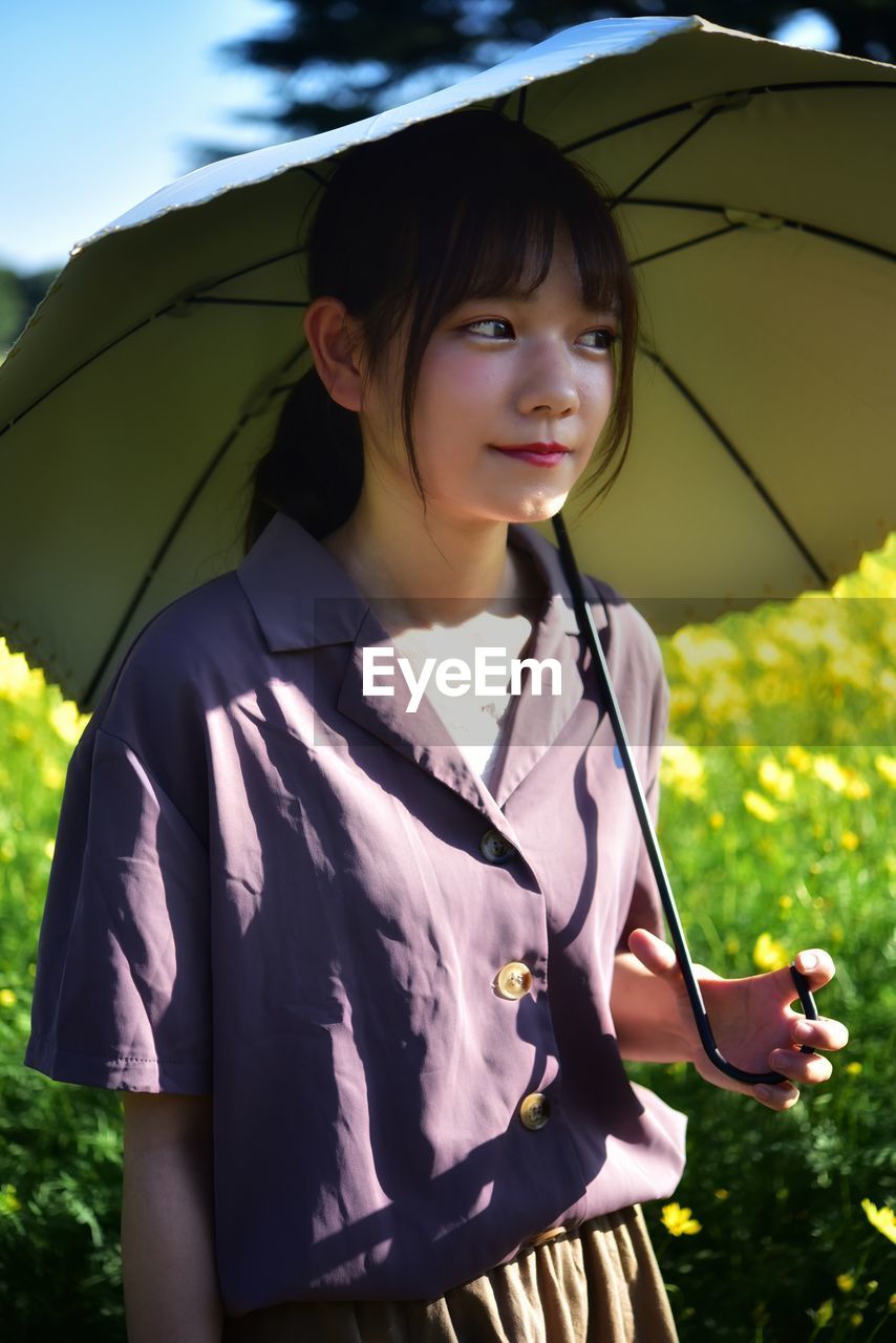 Portrait of girl standing outdoors