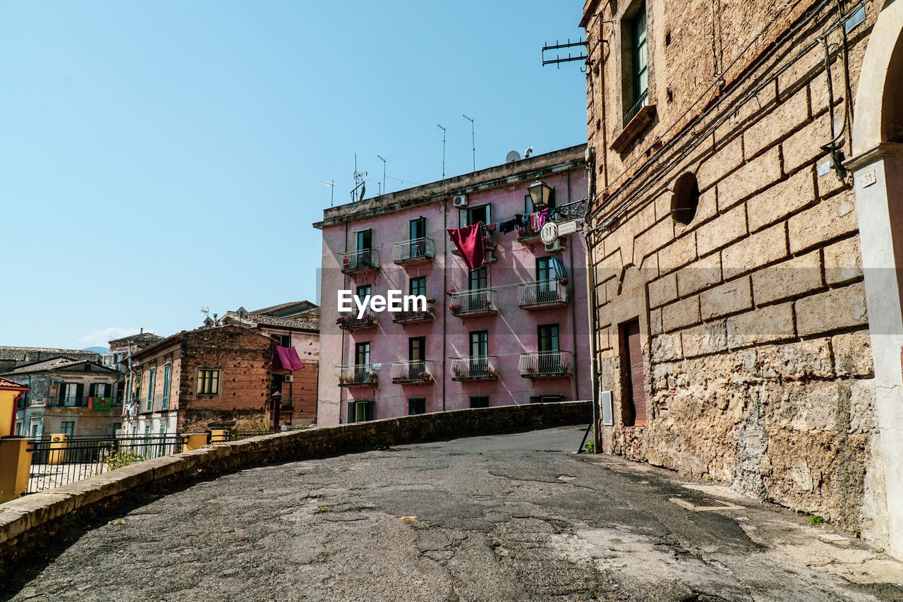 Low angle view of old building against clear sky